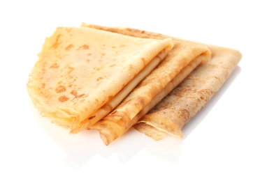 Photo of Tasty thin folded pancakes on white background