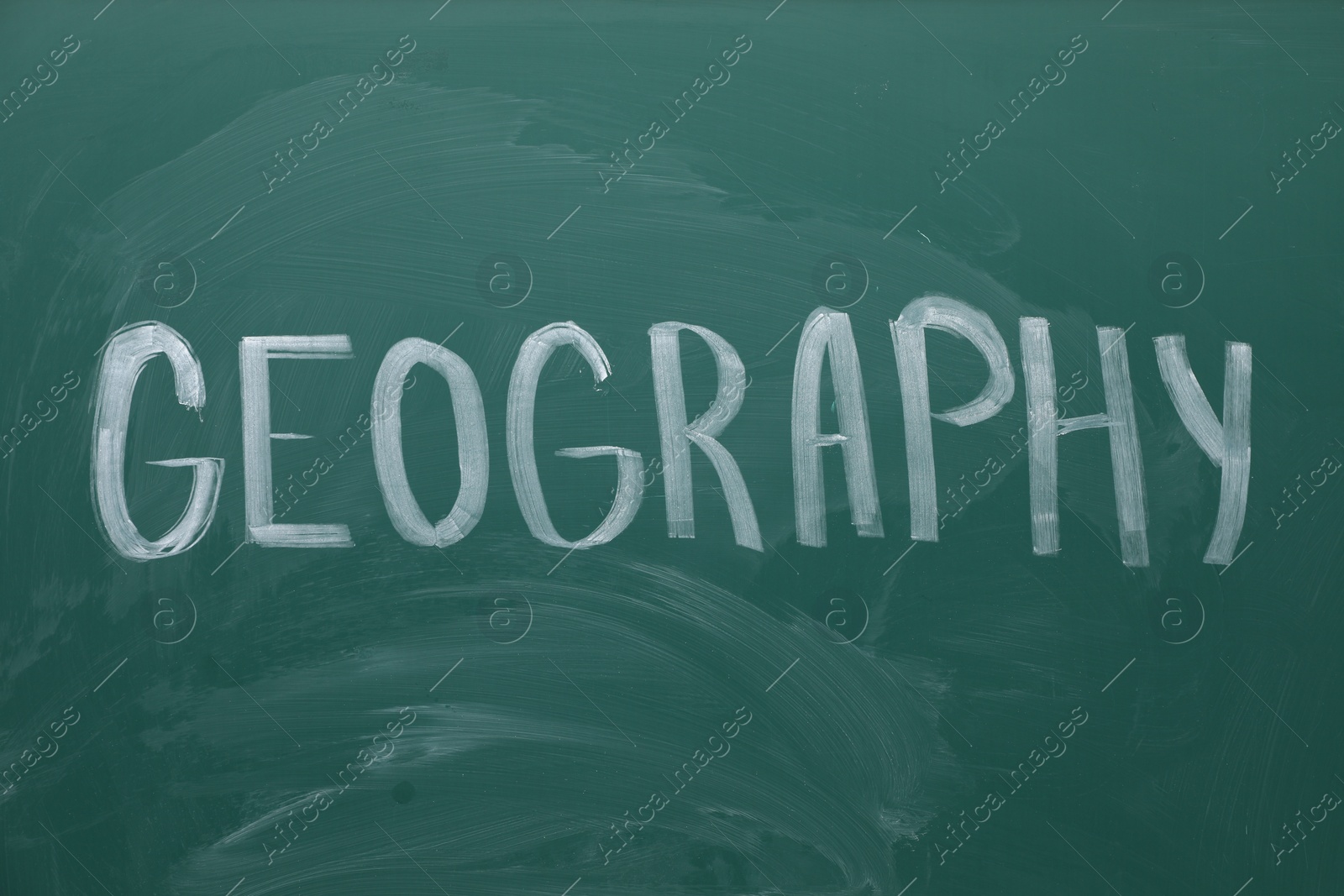 Photo of Word Geography written with chalk on green board