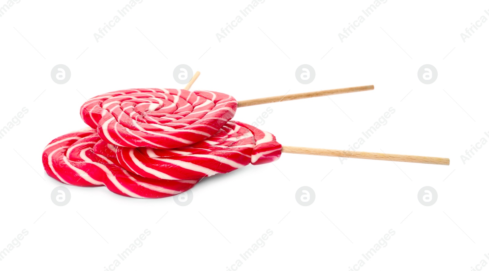 Photo of Sweet heart shaped lollipops on white background. Valentine's day celebration