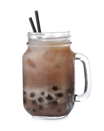 Photo of Tasty brown milk bubble tea in mason jar isolated on white