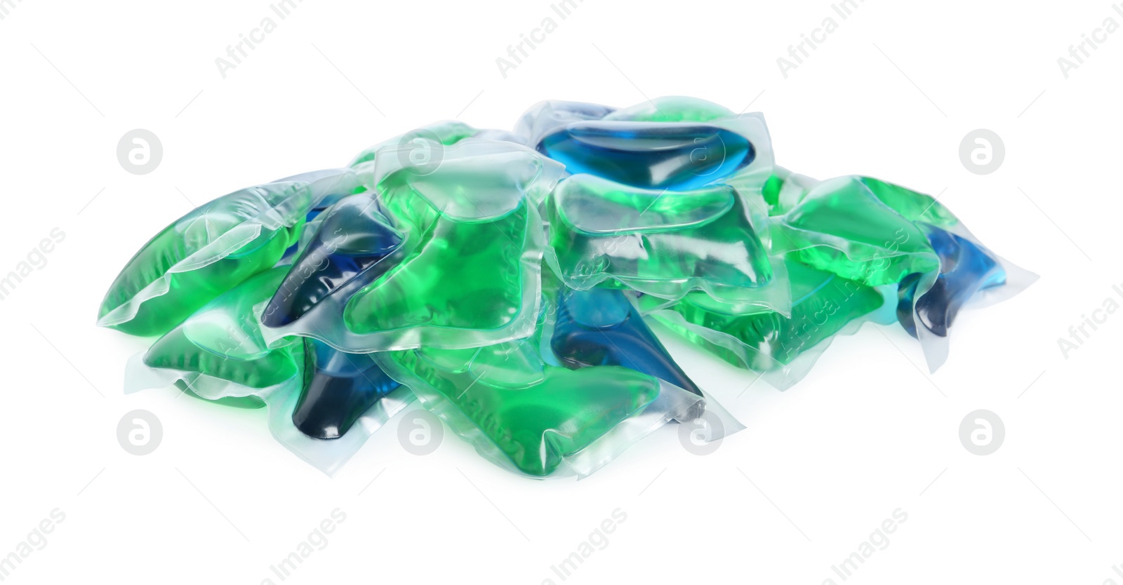 Photo of Heap of laundry capsules on white background