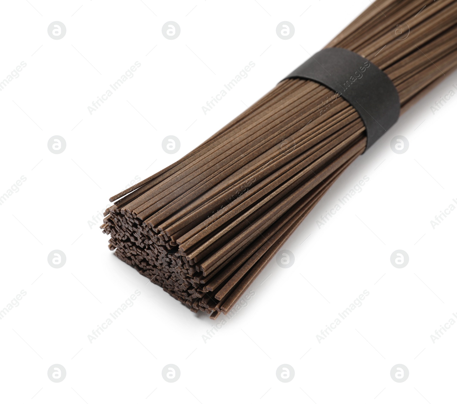 Photo of Uncooked buckwheat noodles (soba) isolated on white