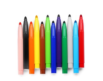 Many different colorful markers on white background, top view