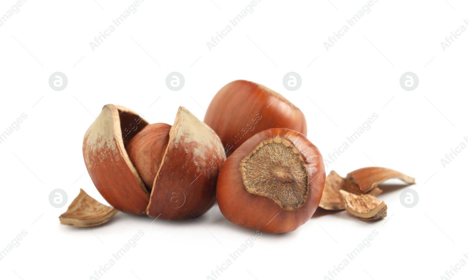 Photo of Tasty organic hazelnuts on white background. Healthy snack