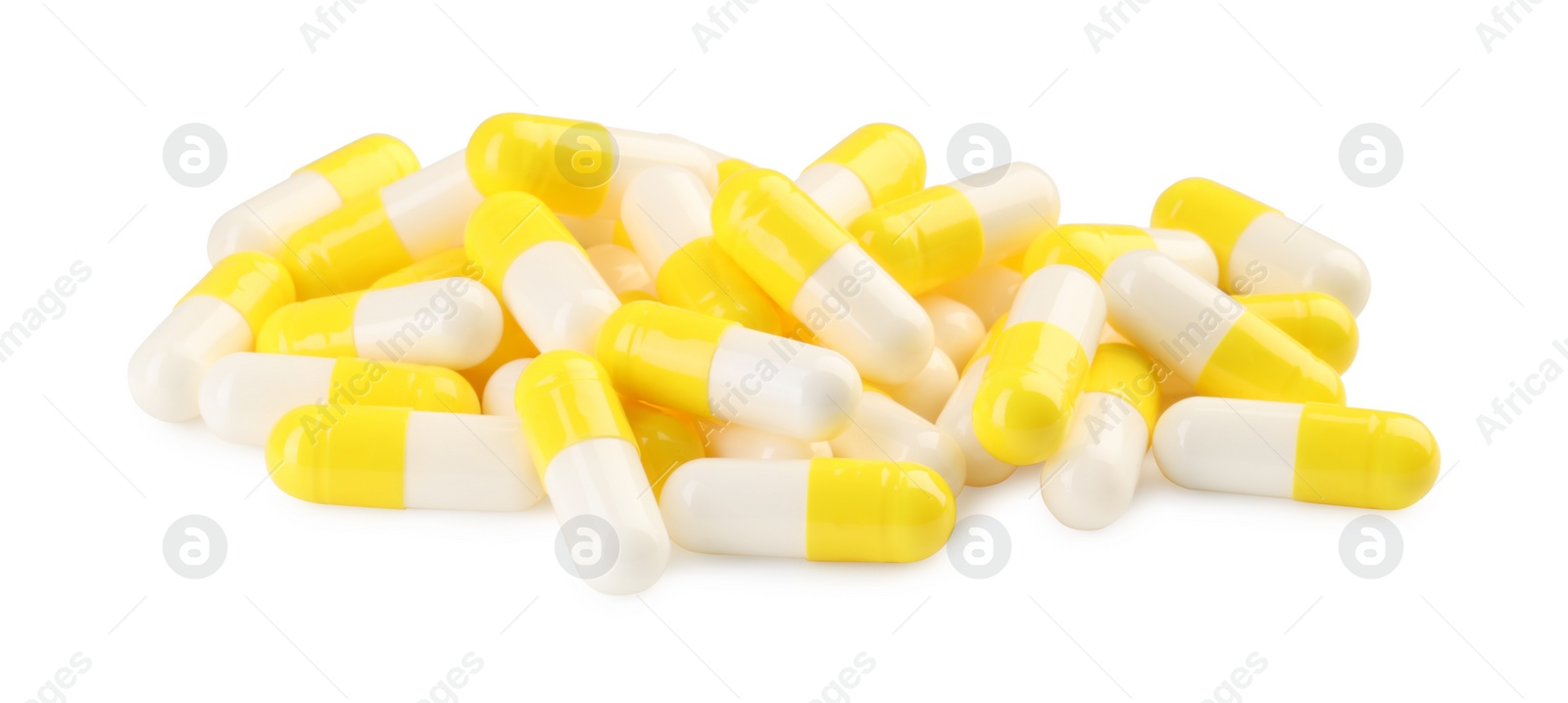 Photo of Many antibiotic pills isolated on white. Medicinal treatment