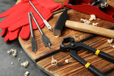 Set of modern carpenter's tools on grey table