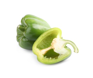 Cut and whole fresh green bell peppers isolated on white