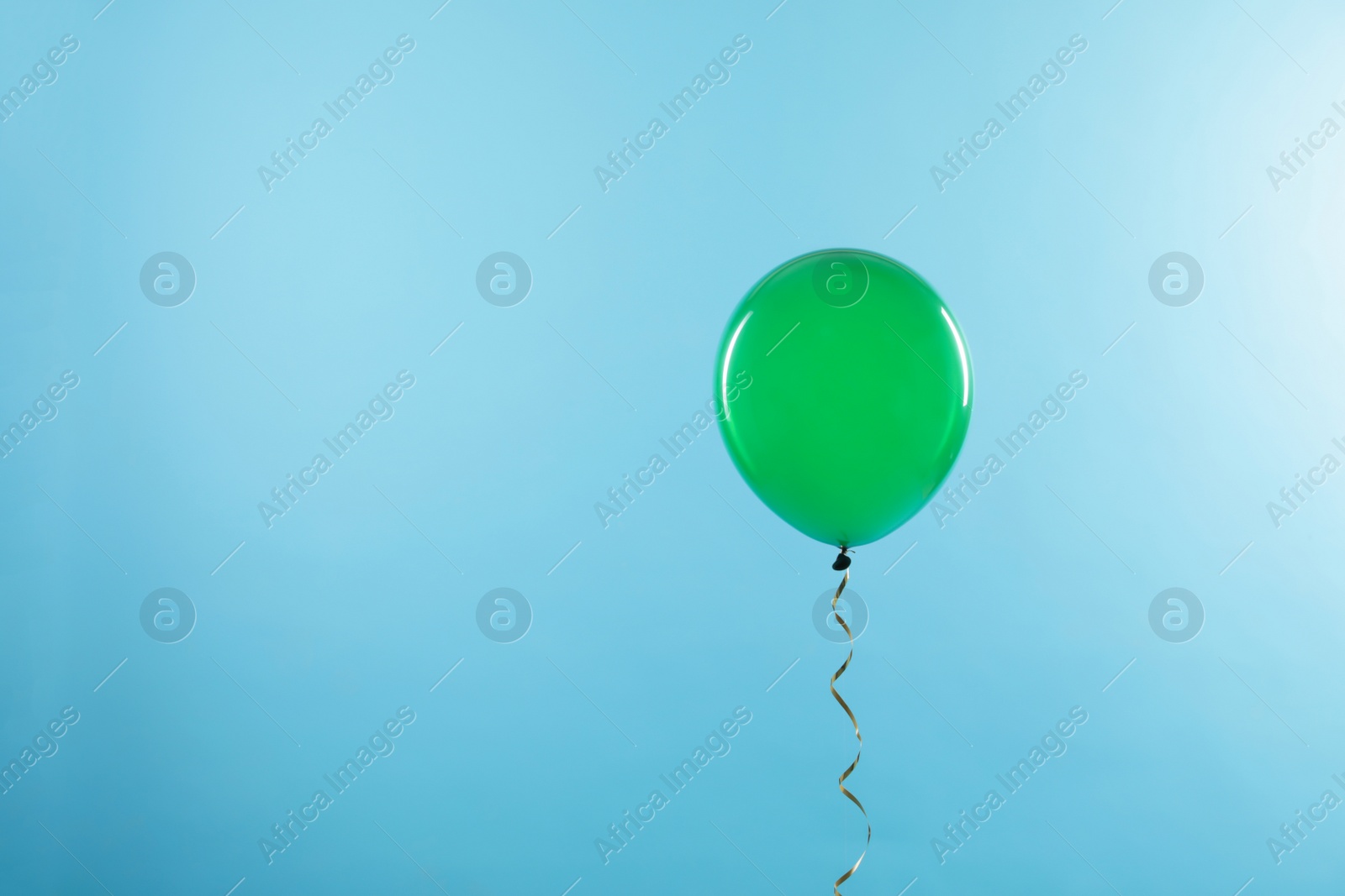 Photo of Bright balloon on color background, space for text. Celebration time