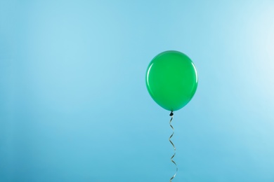 Photo of Bright balloon on color background, space for text. Celebration time