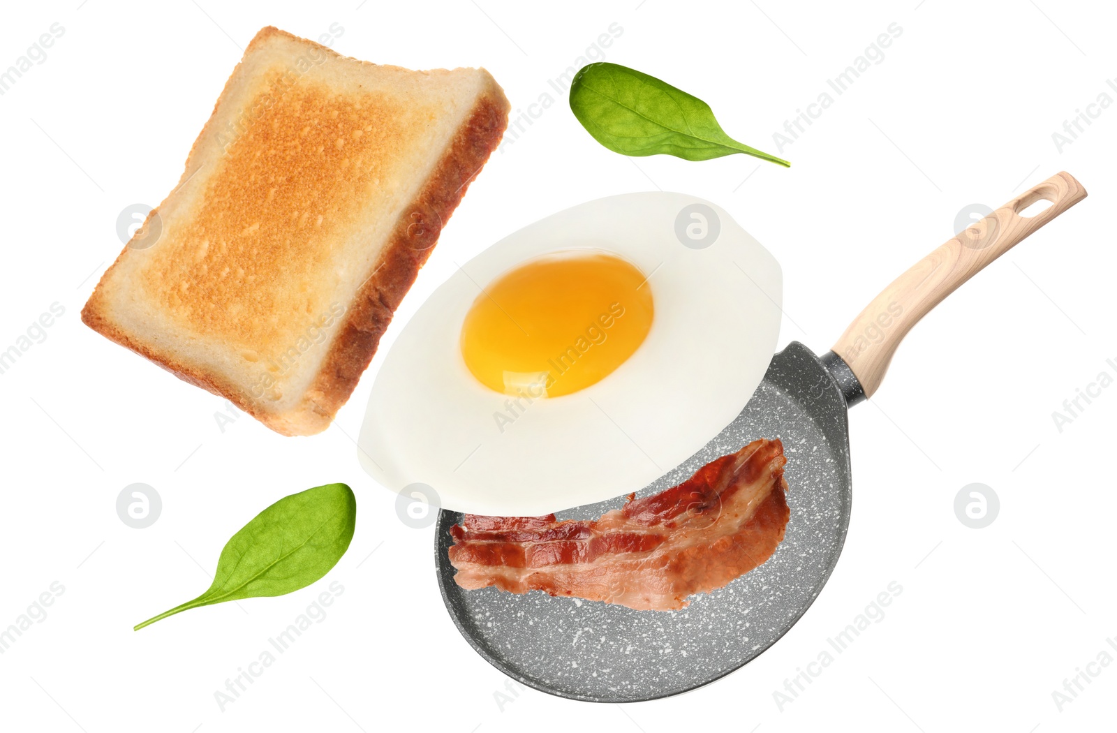 Image of Tasty fried chicken egg, bacon, toasted bread and basil leaves falling into frying pan on white background