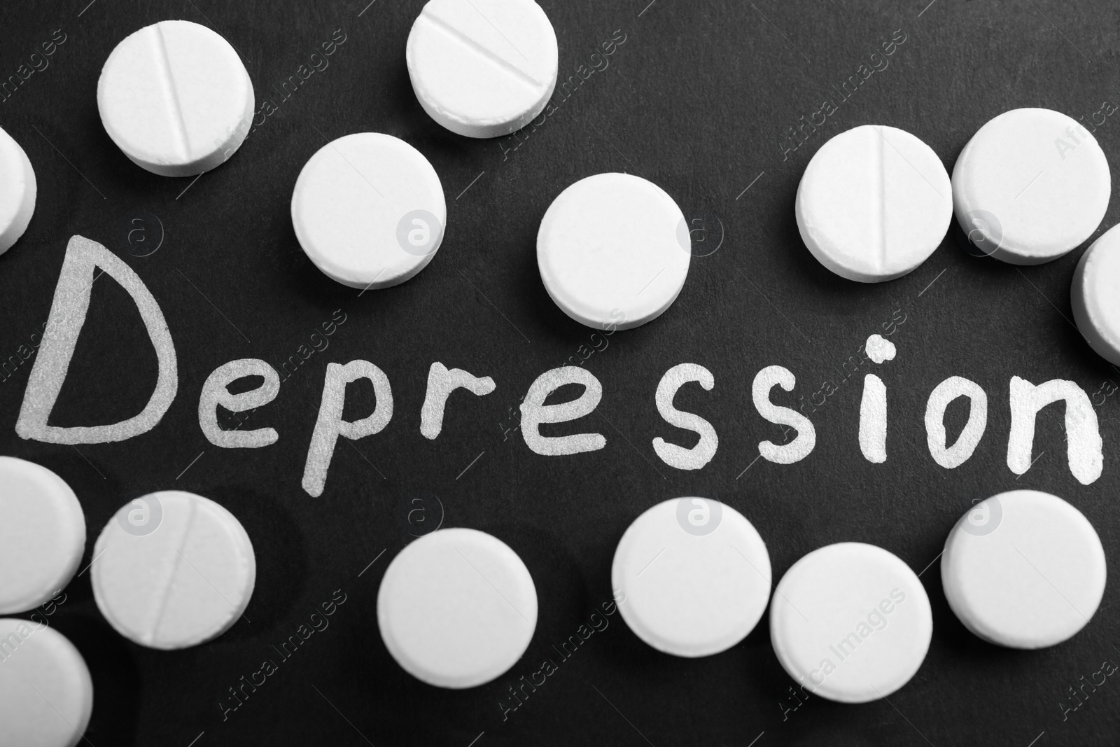 Photo of Word Depression and many pills on black background, flat lay