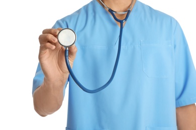 Photo of Male doctor with stethoscope on white background, closeup. Medical object