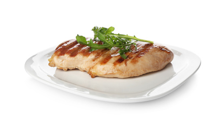 Photo of Tasty grilled chicken fillet with arugula isolated on white