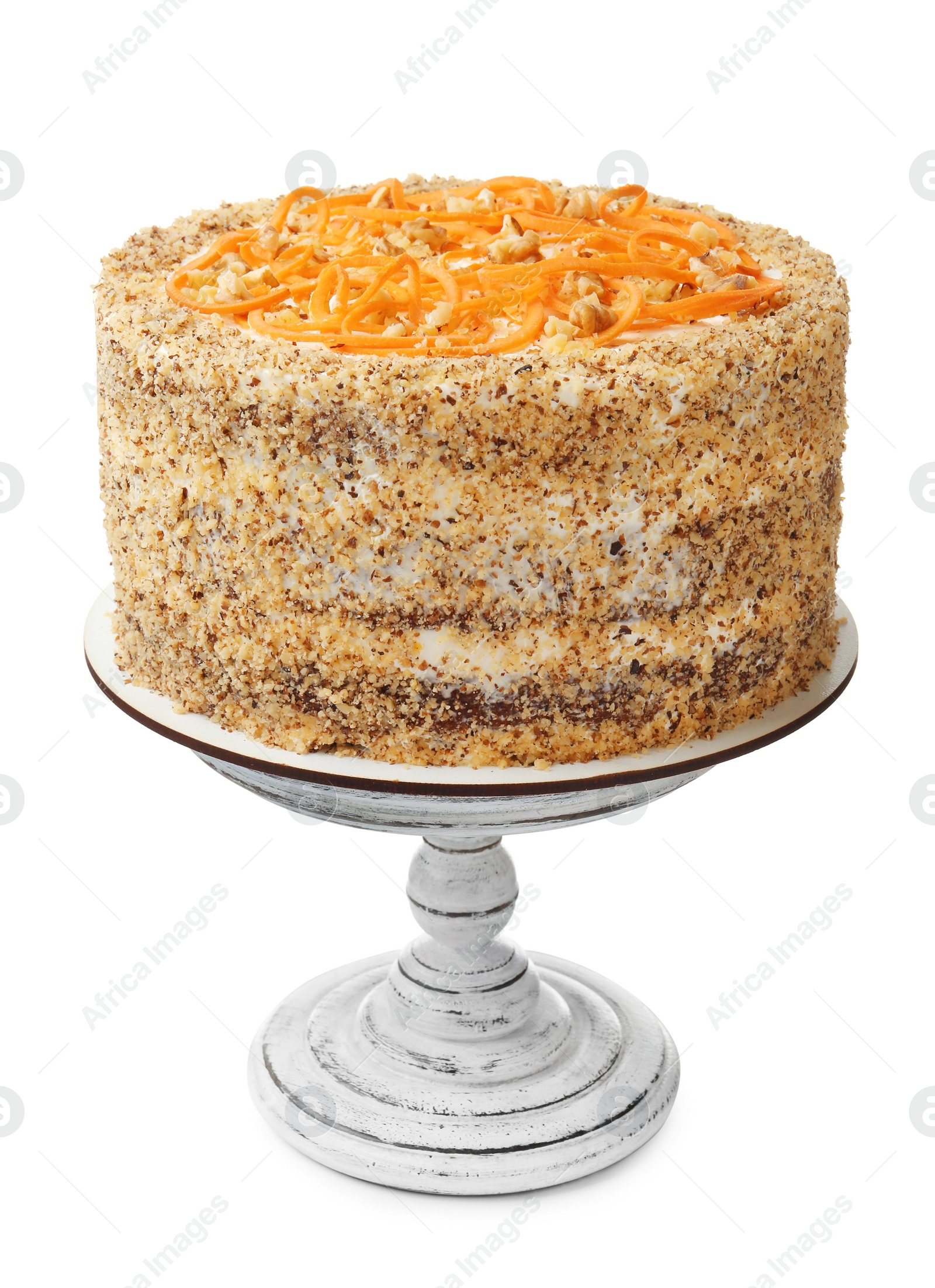 Photo of Stand with delicious carrot cake on white background