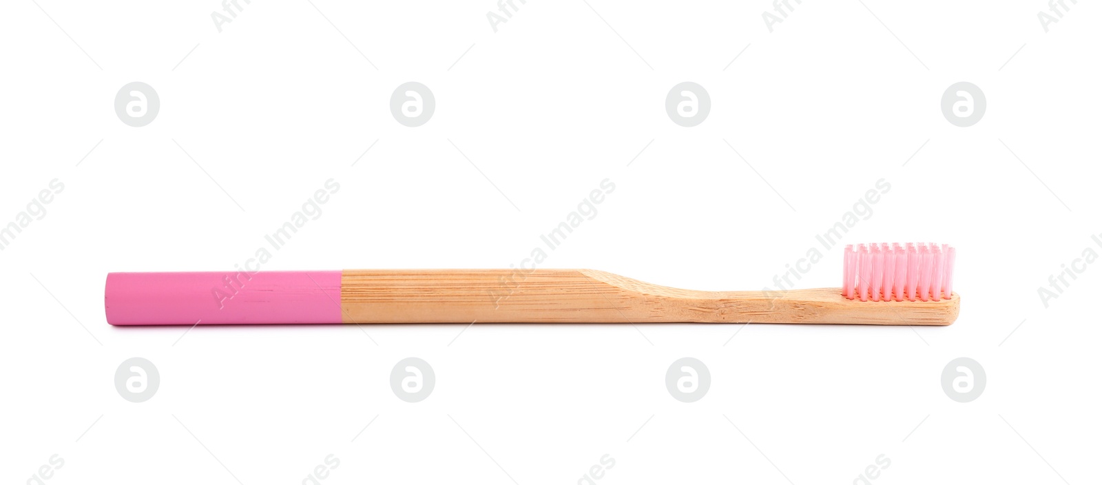 Photo of Bamboo toothbrush with pink bristle isolated on white