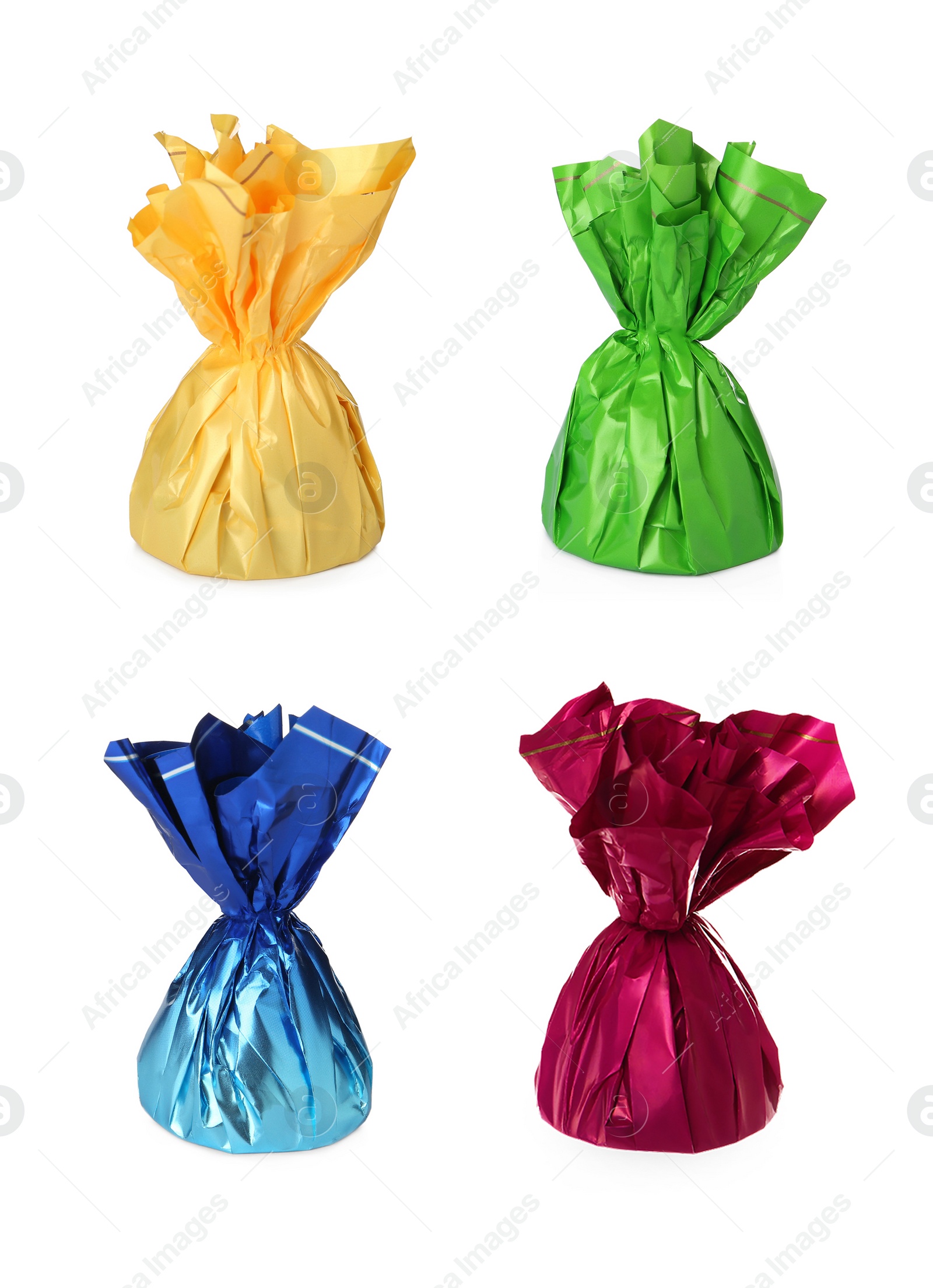 Image of Set with tasty candies in colorful wrappers on white background