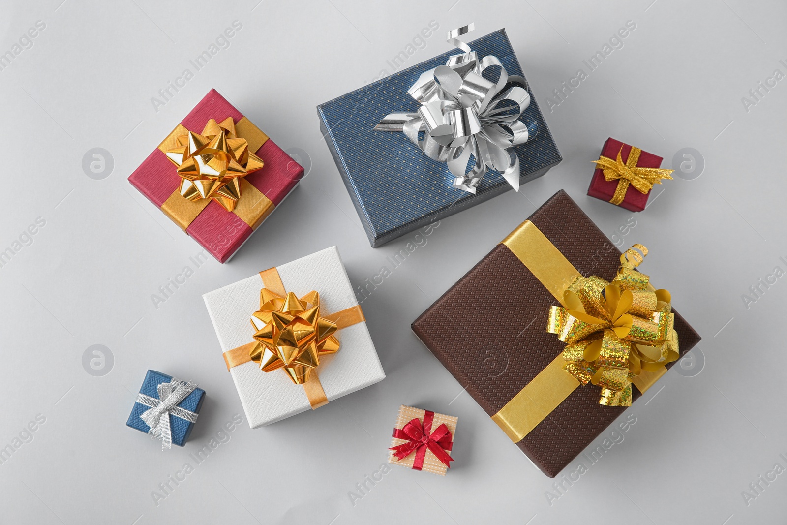 Photo of Beautiful gift boxes on white background, top view