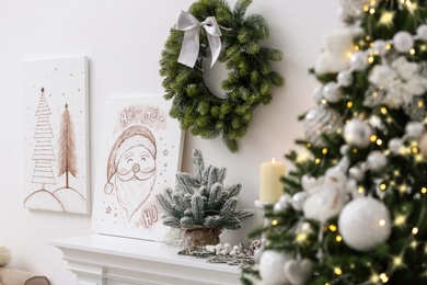 Photo of Beautiful Christmas pictures in festive room interior