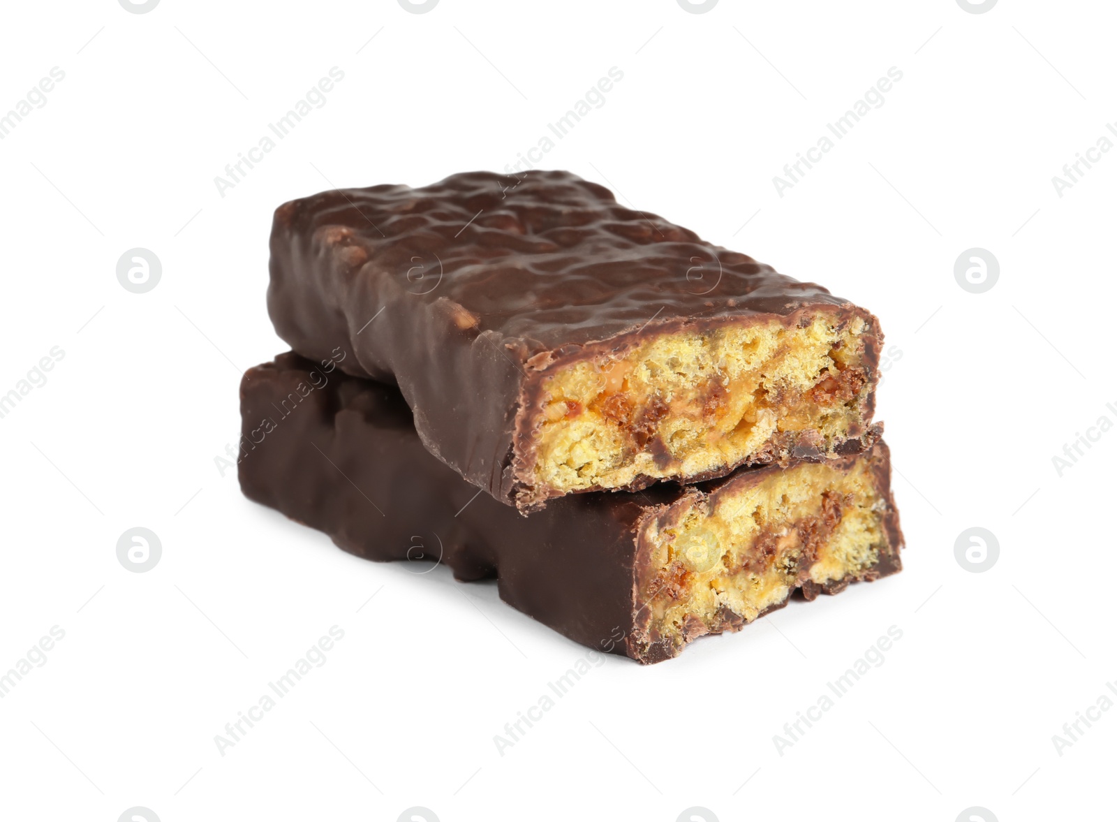 Photo of Halves of tasty chocolate glazed protein bar on white background