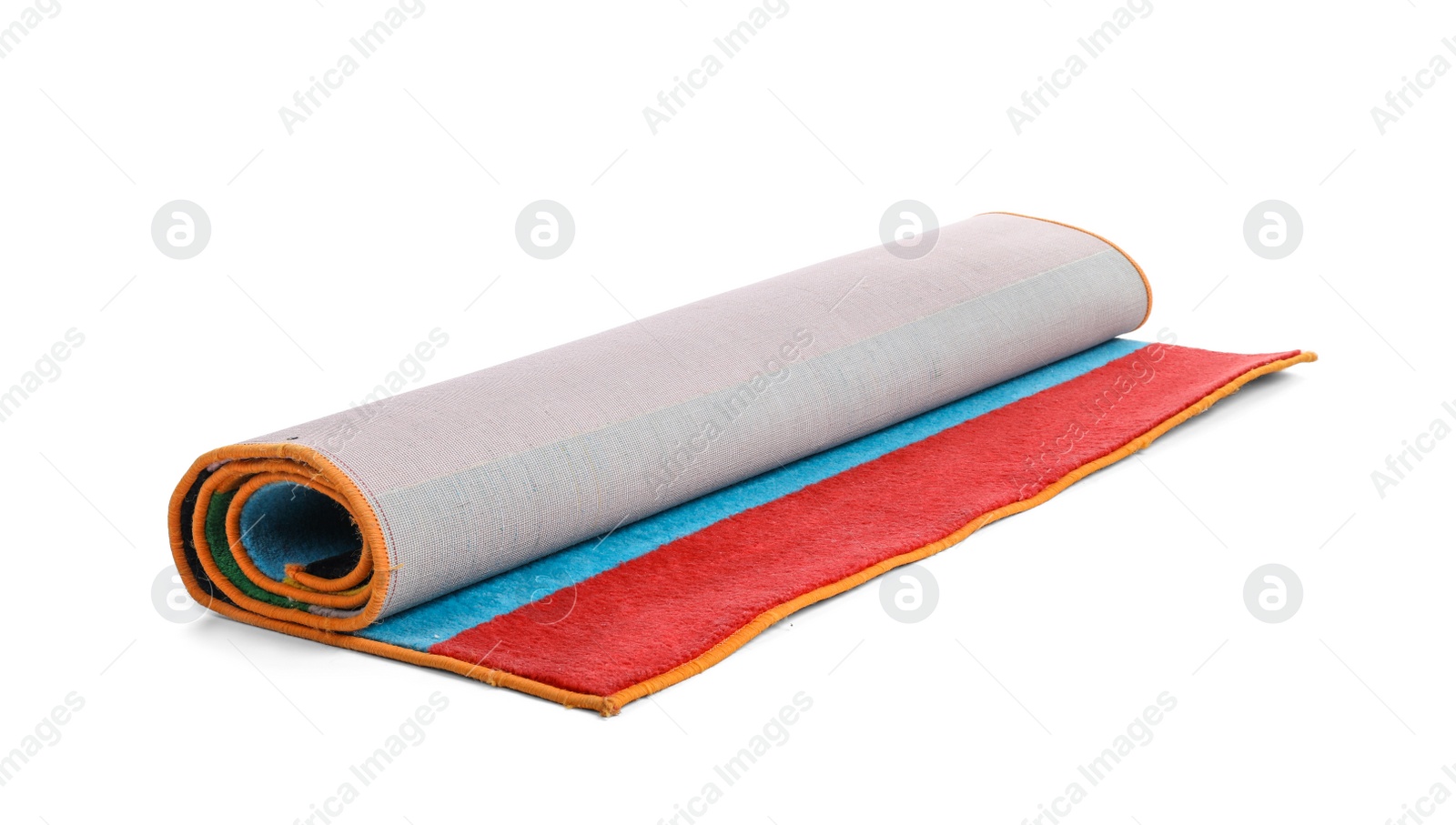 Photo of Rolled colorful carpet on white background. Interior element