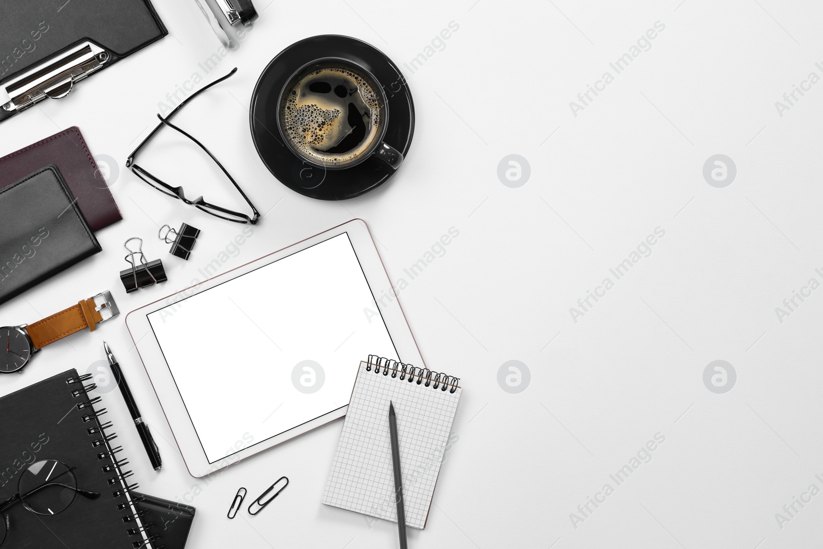 Photo of Flat lay composition with modern tablet on white background. Space for text