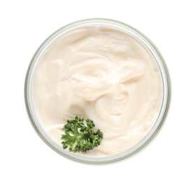 Photo of Mayonnaise with parsley in glass jar isolated on white, top view