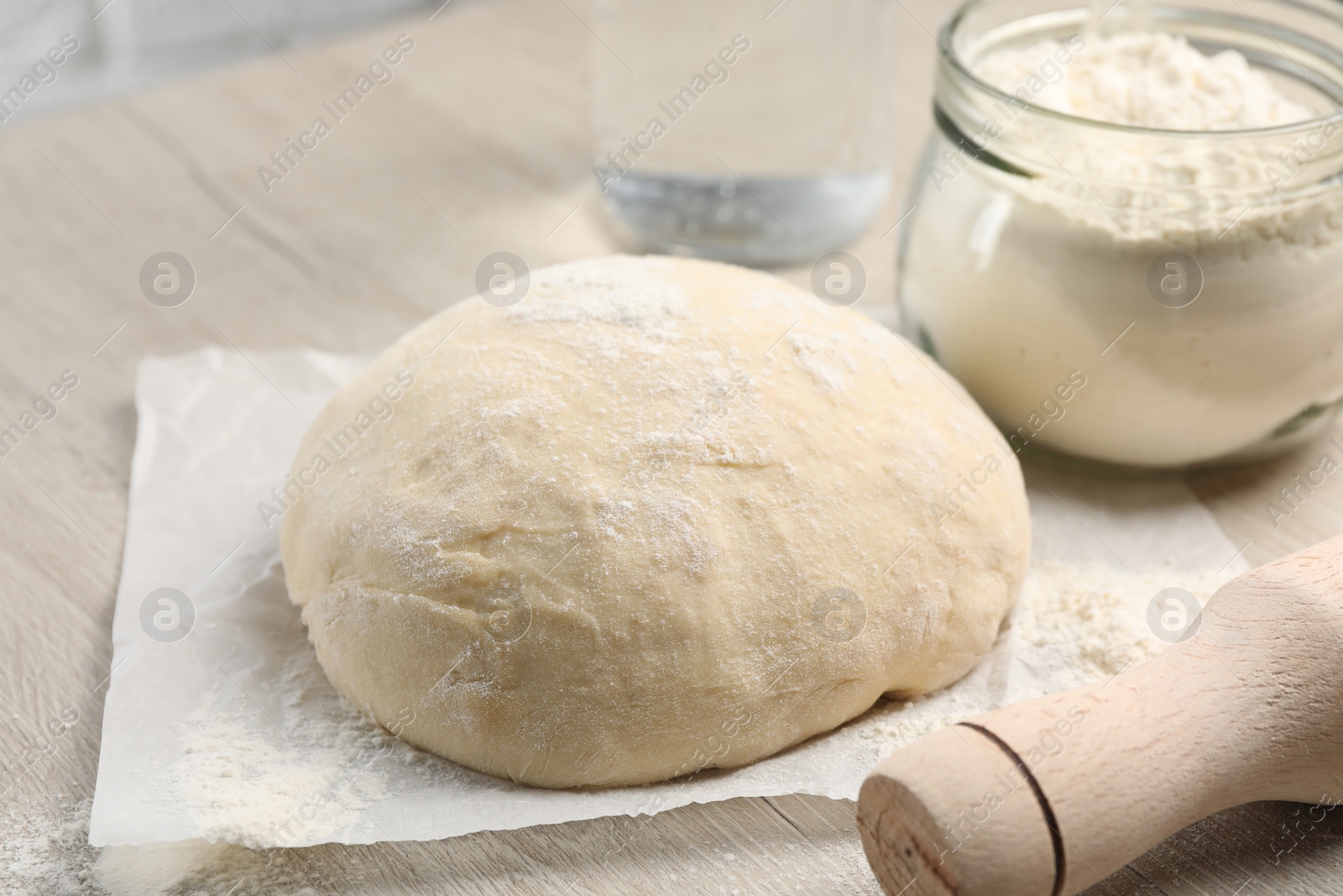 Photo of Cooking scones with soda water. Dough and ingredients on white wooden table, closeup