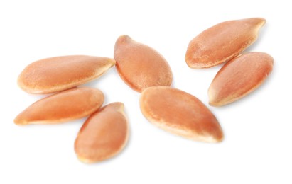 Photo of Pile of linseeds on white background. Vegetable planting