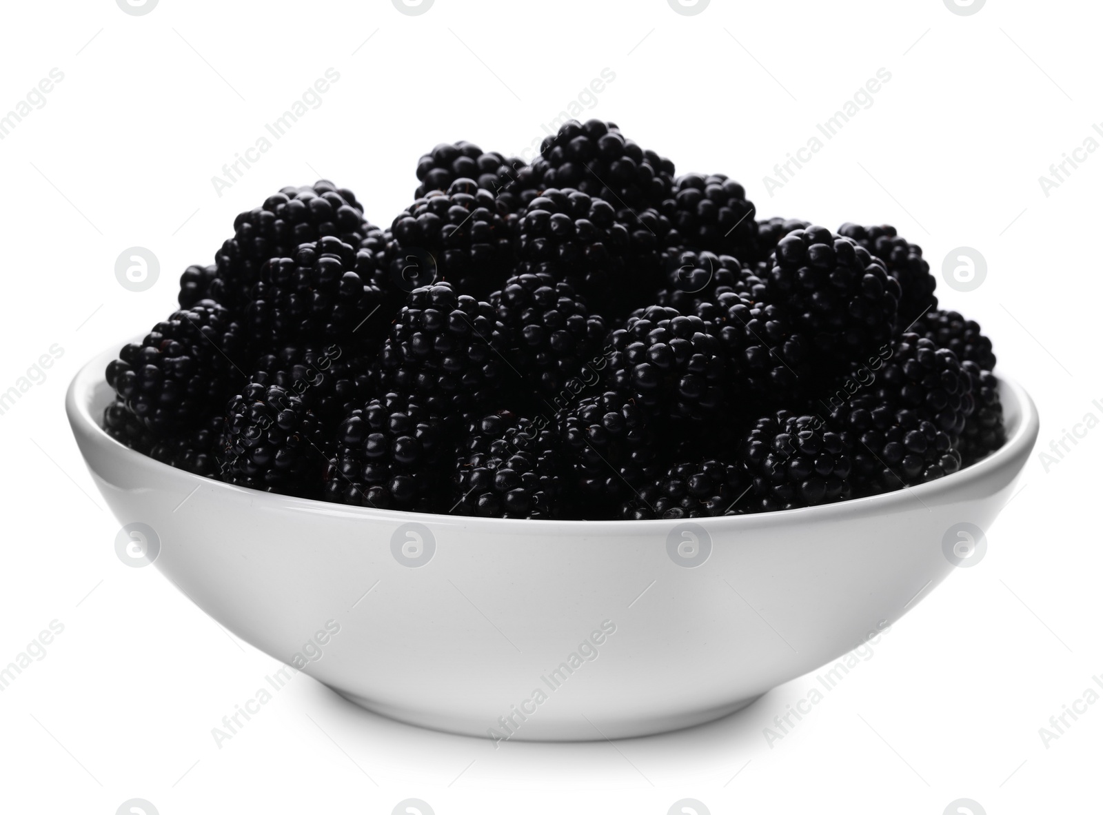 Photo of Bowl of tasty ripe blackberries on white background