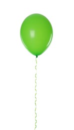 Photo of Green balloon with ribbon isolated on white