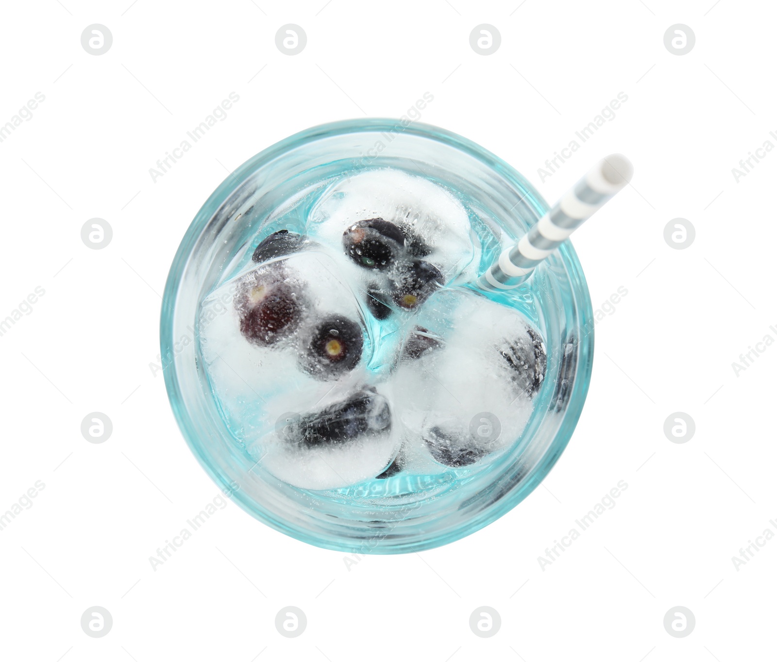 Photo of Tasty cocktail with blueberry ice cubes on white background, top view