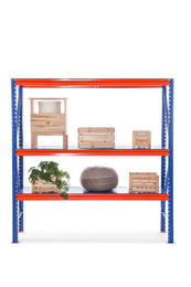 Photo of Bright metal shelving unit with wooden crates and houseplant on white background