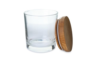 Photo of New empty glass jar with wooden lid isolated on white