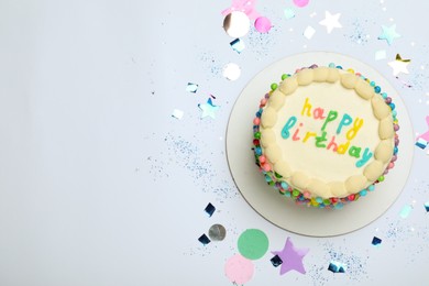 Photo of Cute bento cake with tasty cream and confetti on white background, top view