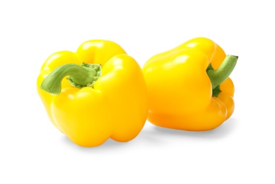 Photo of Ripe yellow bell peppers isolated on white