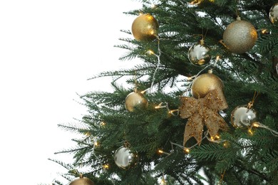 Photo of Christmas tree with beautiful decorations on white background, closeup