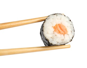 Photo of Chopsticks with tasty fresh sushi roll isolated on white