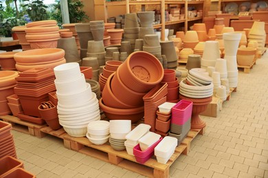 Many different flower pots in gardening shop