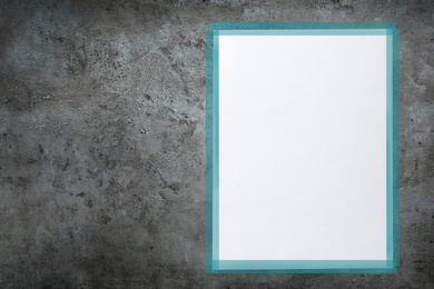 Image of Blank poster on cement wall. Space for design