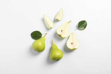 Photo of Ripe juicy pears on white background, top view