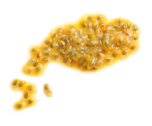 Photo of Passion fruit seeds on white background, top view