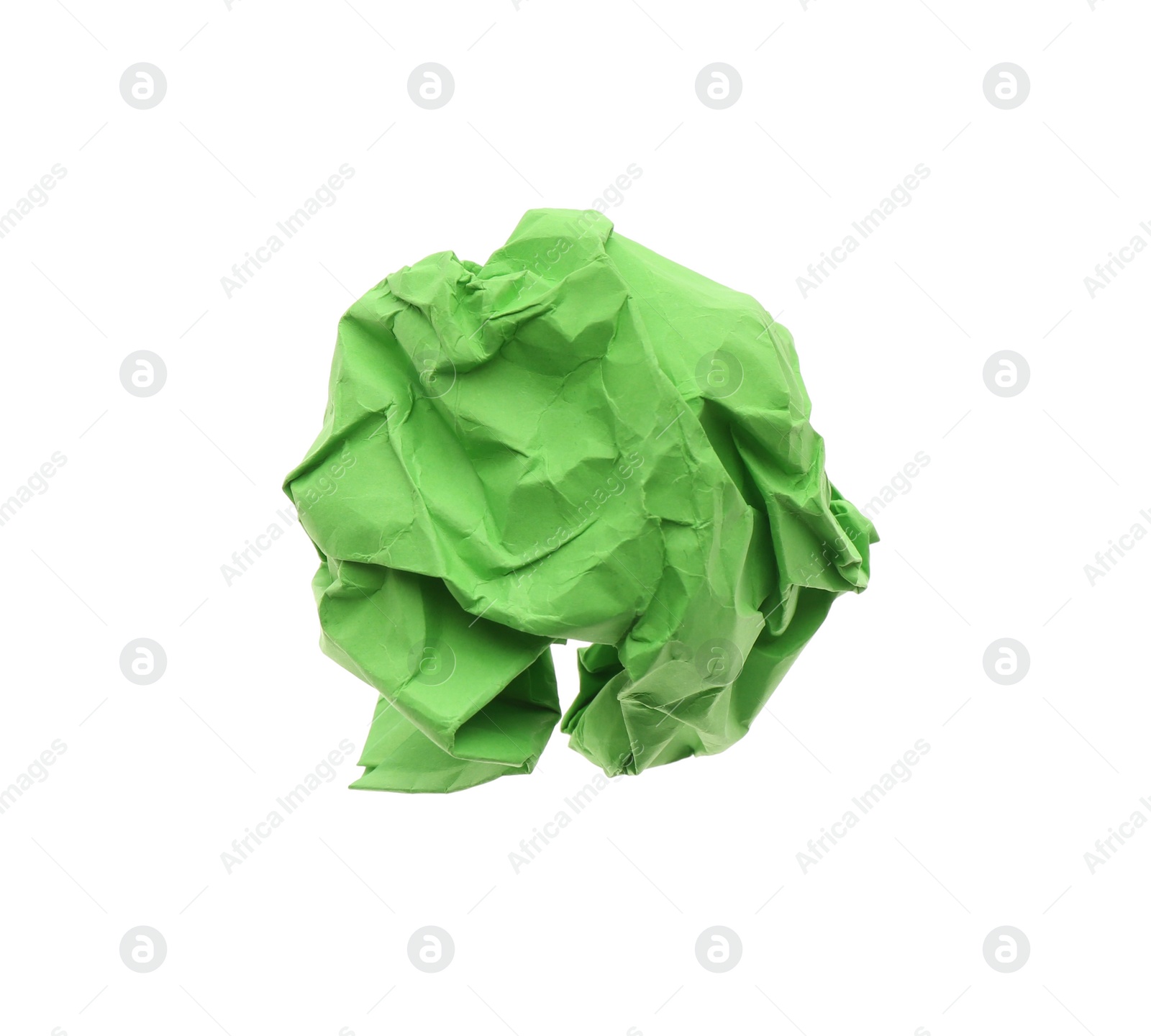 Photo of Crumpled sheet of green paper isolated on white, top view