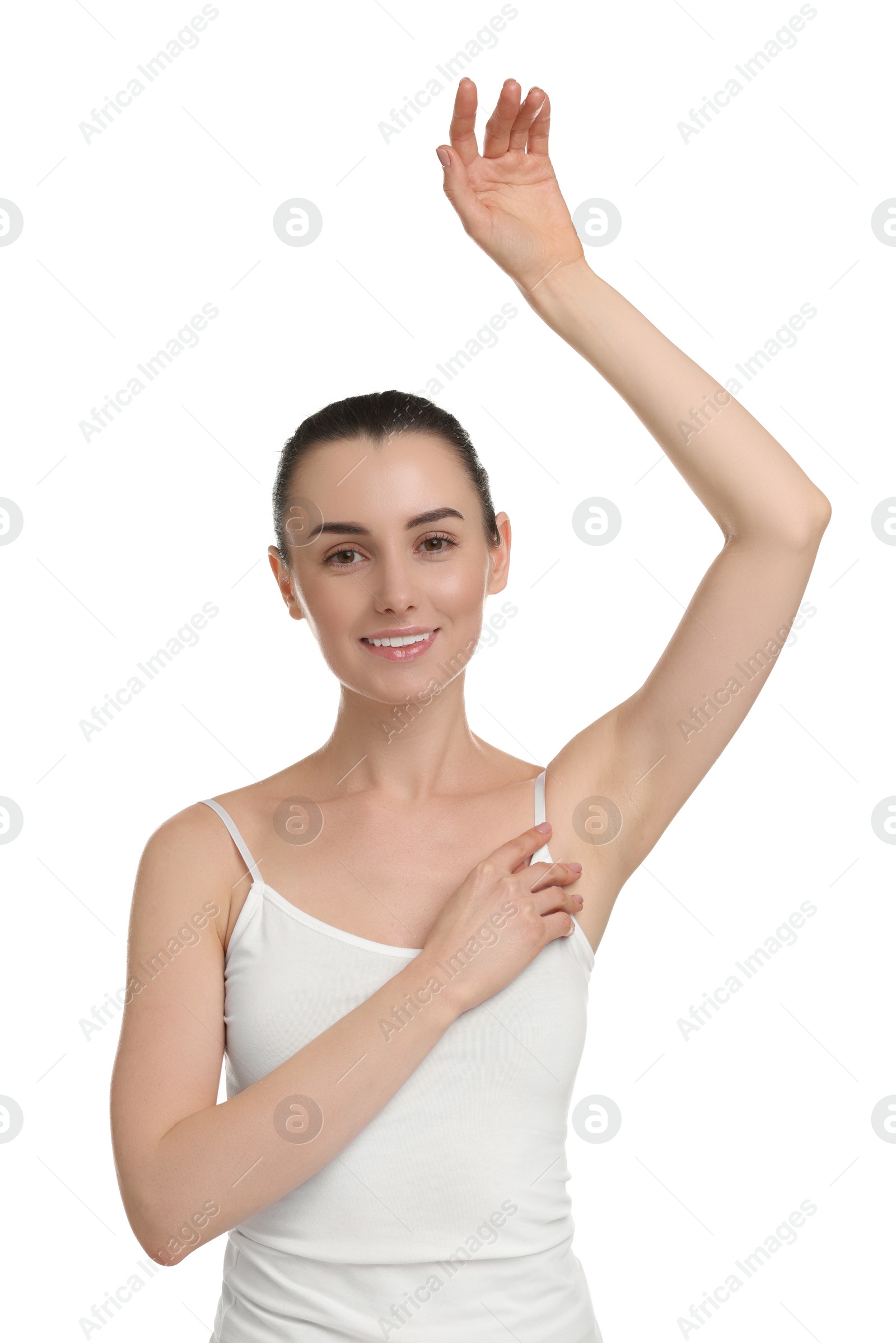 Photo of Beautiful woman showing armpit with smooth clean skin on white background