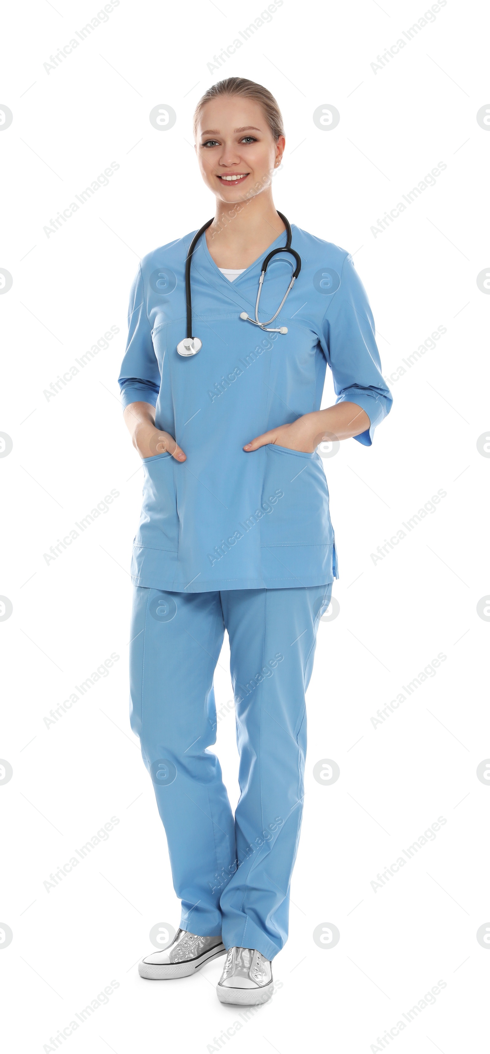 Photo of Full length portrait of medical doctor with stethoscope isolated on white