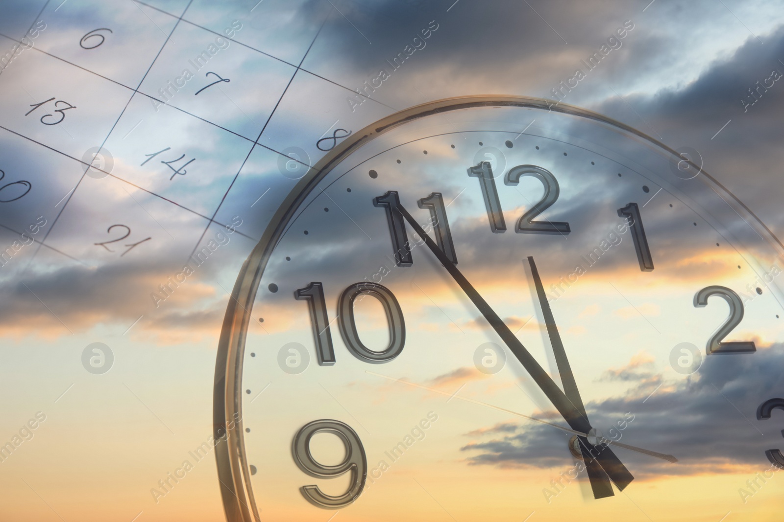 Image of Multiple exposure of clock, calendar and cloudy sky at sunset