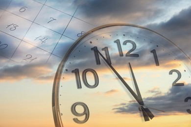 Multiple exposure of clock, calendar and cloudy sky at sunset