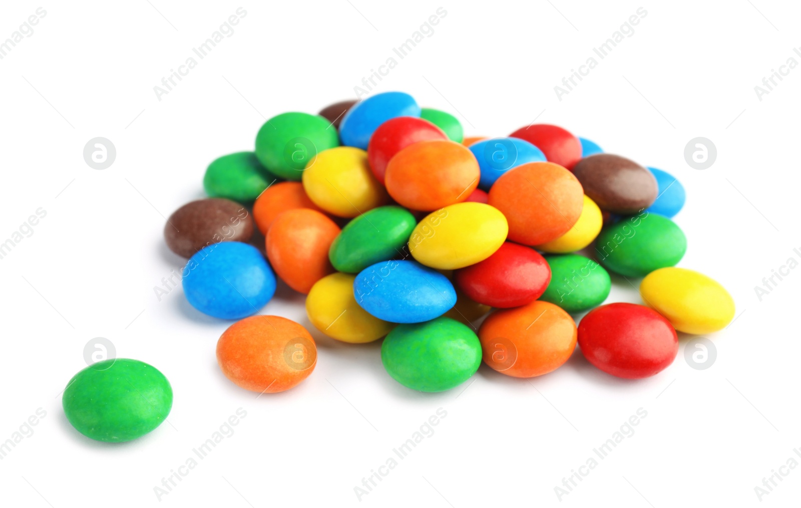 Photo of Pile of colorful candies on white background