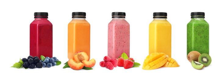 Image of Different delicious smoothies in bottles on white background. Banner design