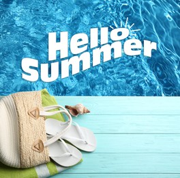 Image of Hello Summer. Beach accessories on light blue wooden deck near swimming pool, flat lay