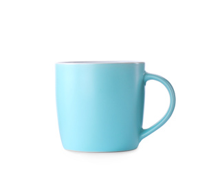 Photo of Beautiful light blue cup isolated on white